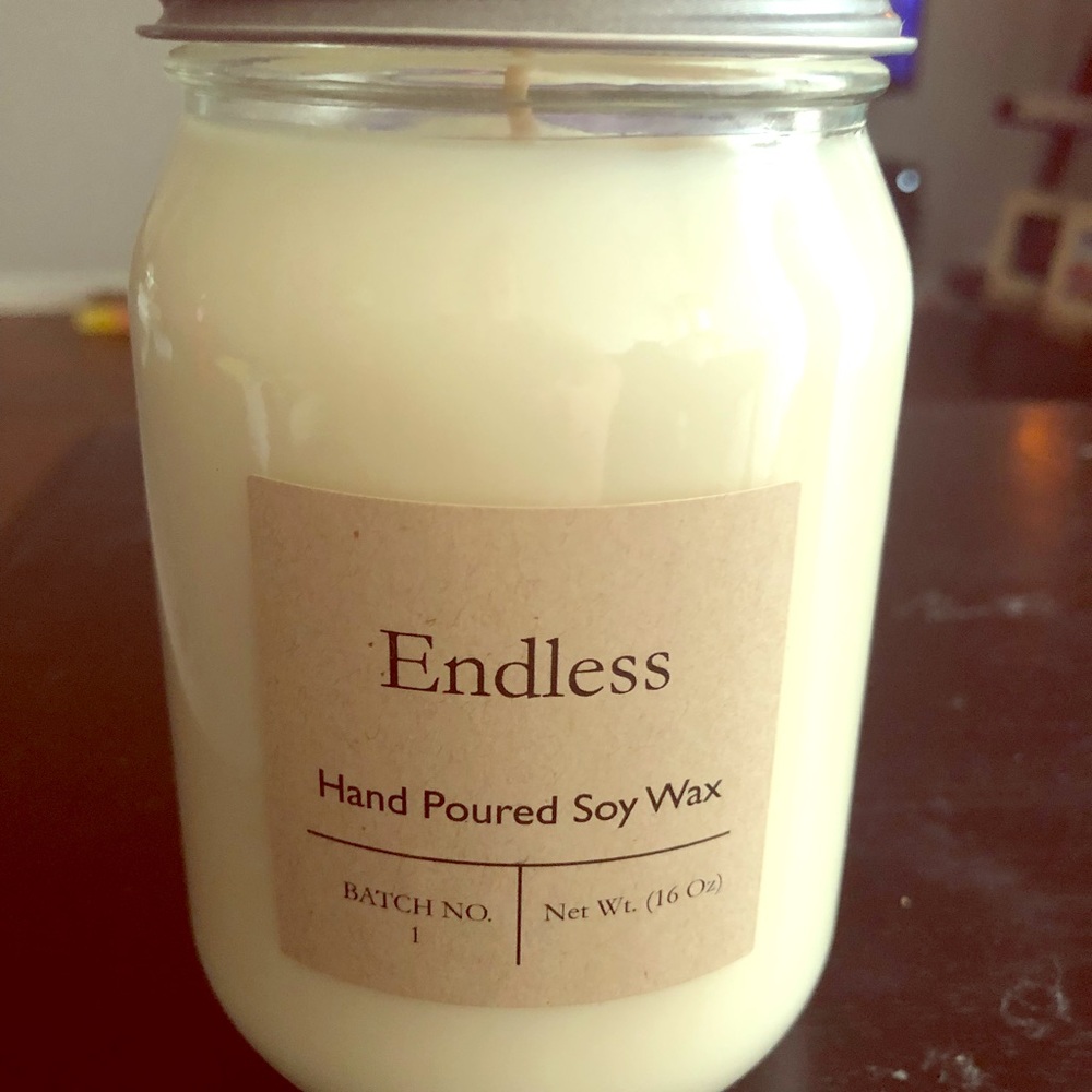 Endless Hand Poured Soy Wax candle. Never burned.